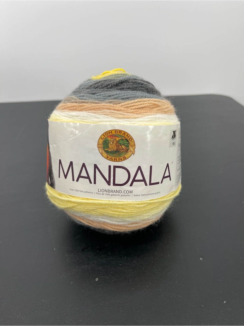 ⭐️Lion Brand Mandala Serpent Yarn Cake in Yellow, Peach, Gray and Cream